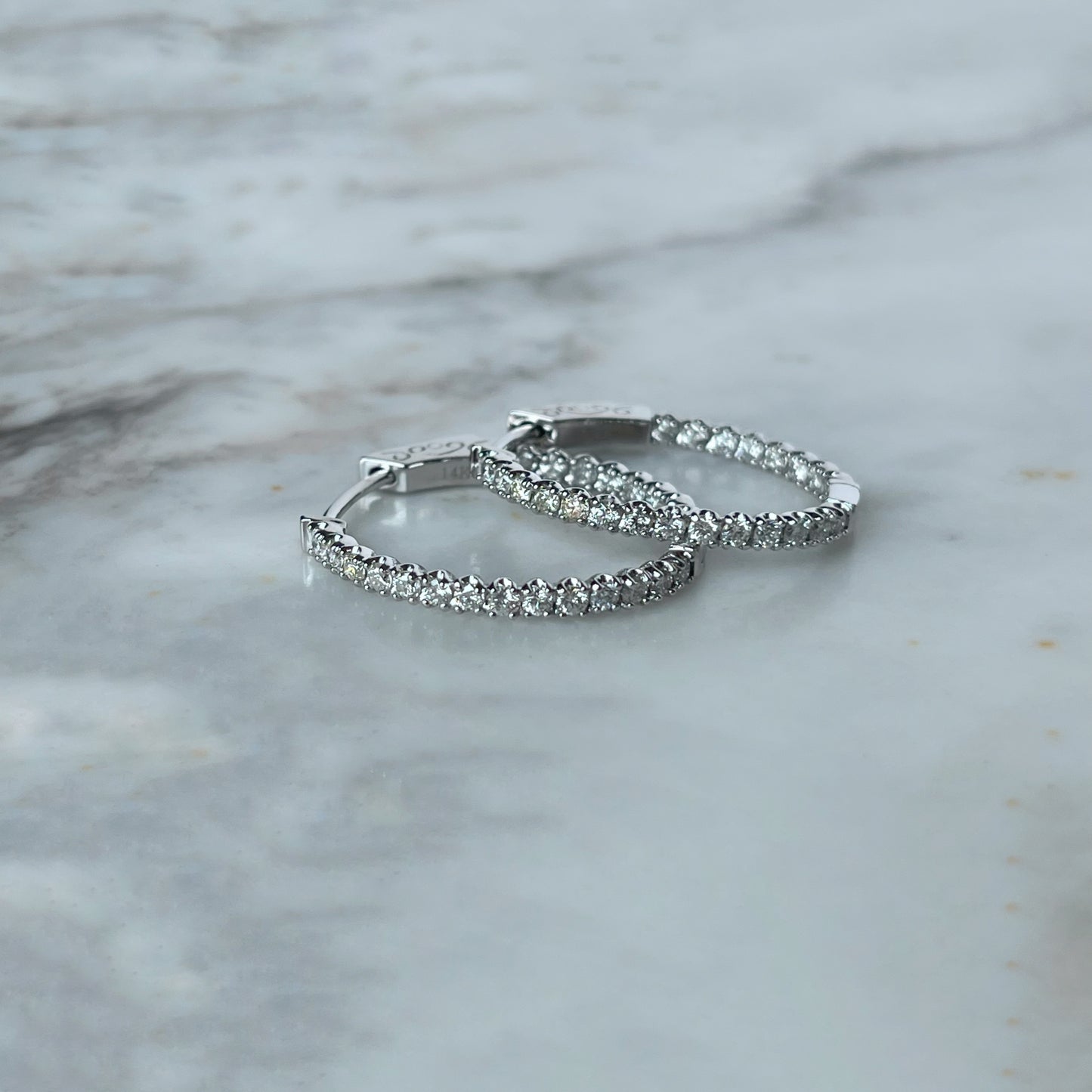Argollas en oro blanco 14K con diamantes 1.02ctw