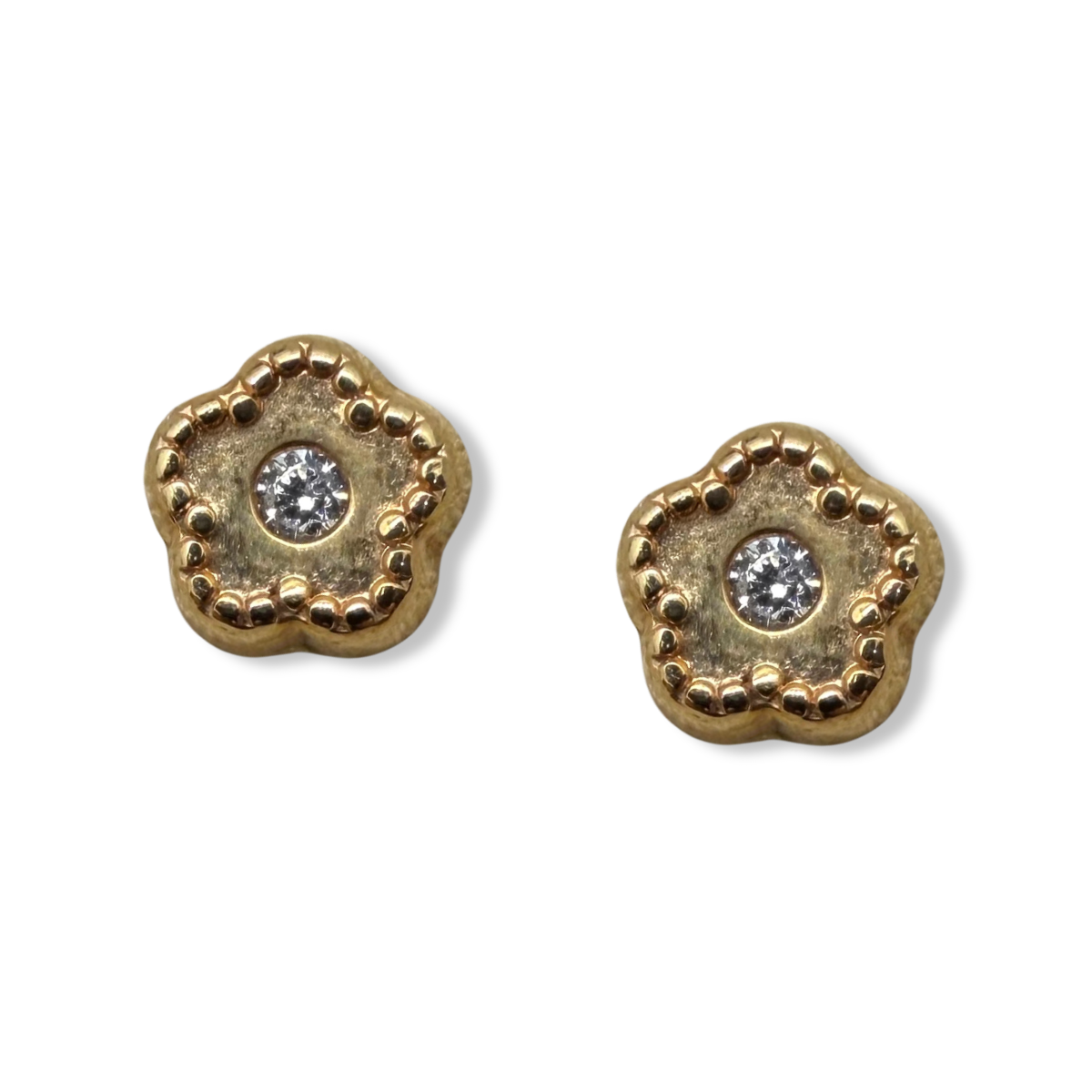 Aretes en oro amarillo 14k de florcita con circonita en el centro