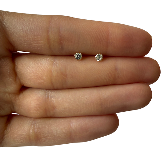 Aretes en oro amarillo 18k con circonita de 8 garritas con tope rosca