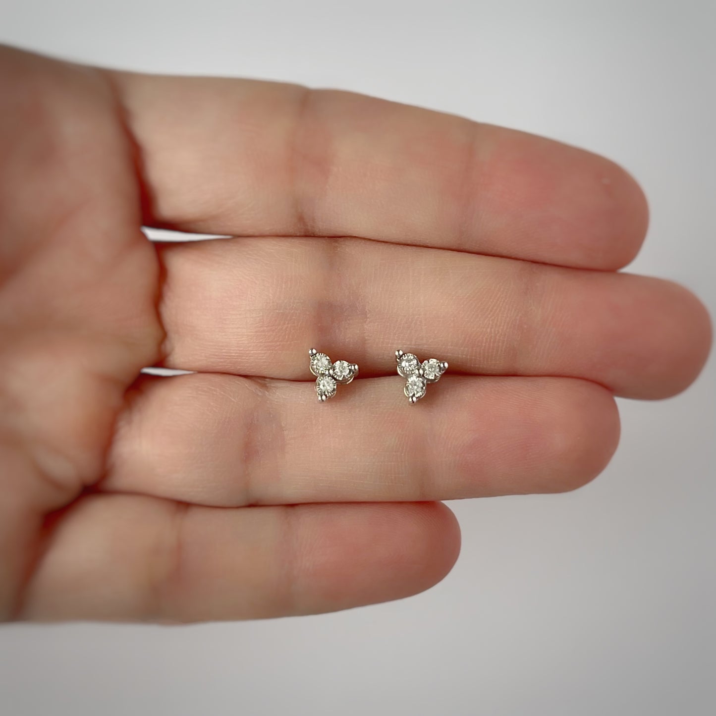 Aretes de plata con trio de diamantes 0.10ctw