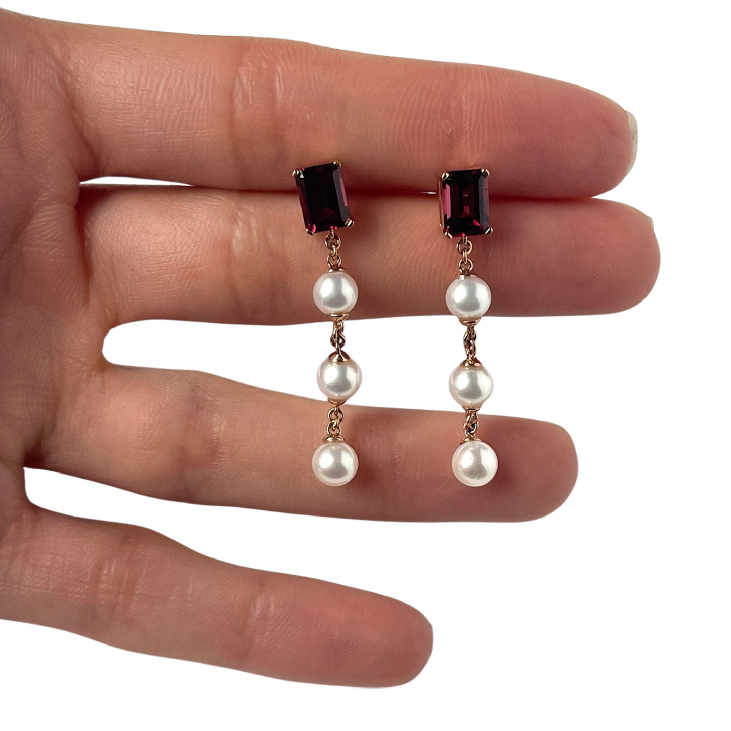 Aretes en oro rosa 10k con granate rodolita y perlas