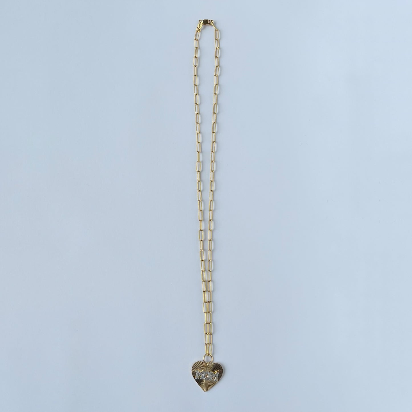 Collar en plata con baño de oro amarillo paperclip y corazón MOM