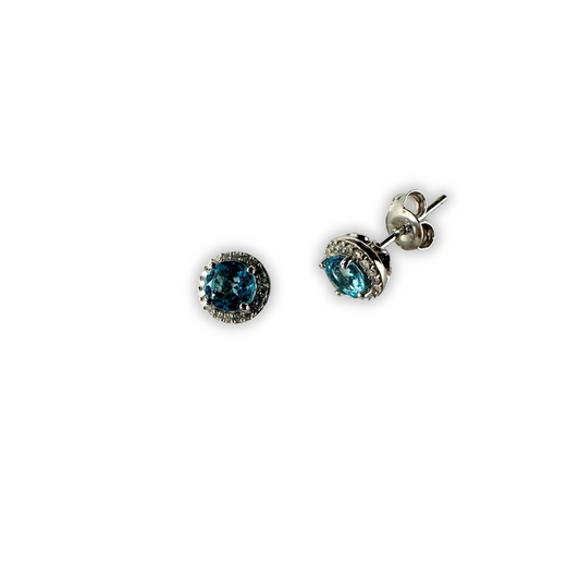 Aretes de plata con Topacio azul y halo de diamantes 0.10ctw