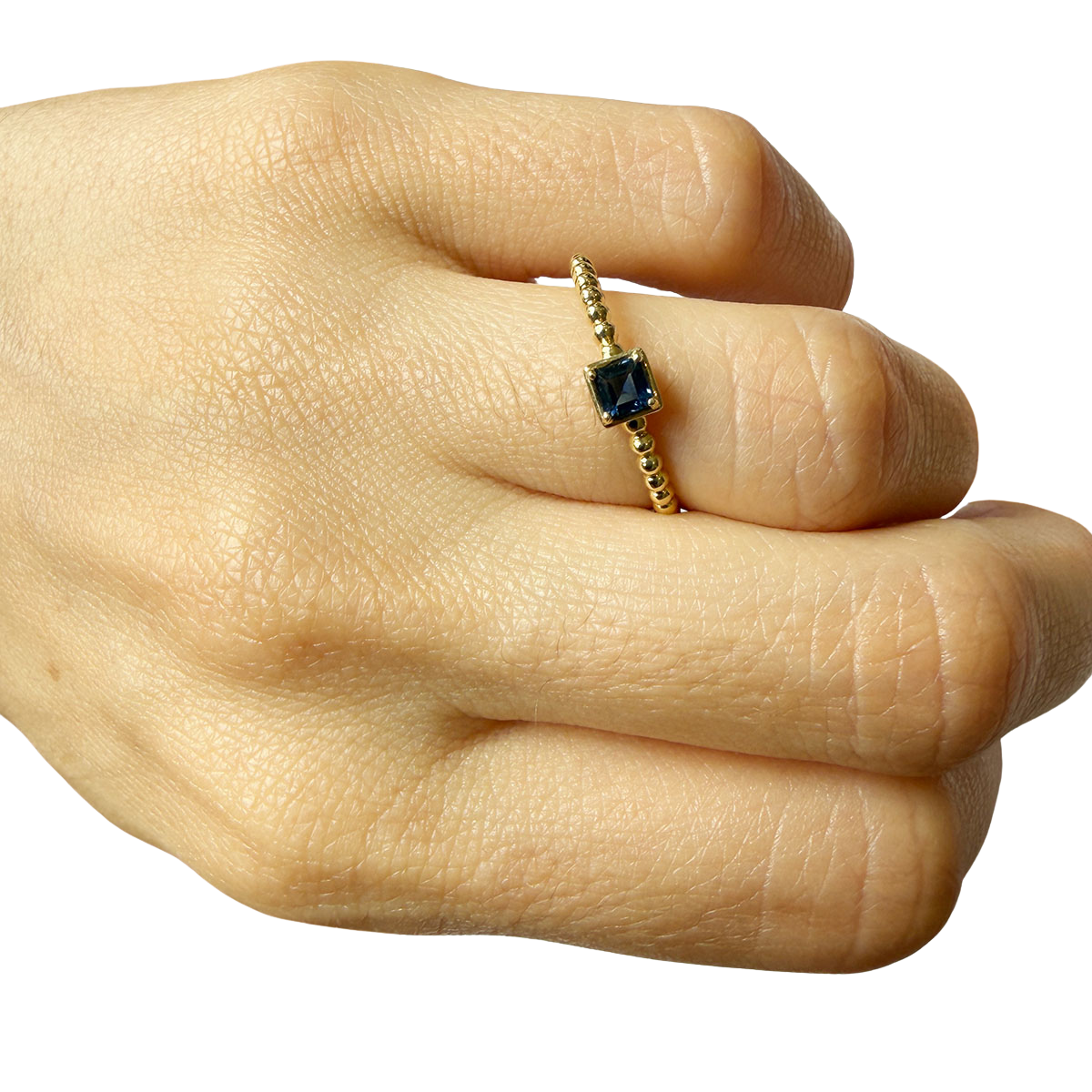 Anillo en oro amarillo 14k con aro de bolitas y zafiro cuadrado 0.25ct