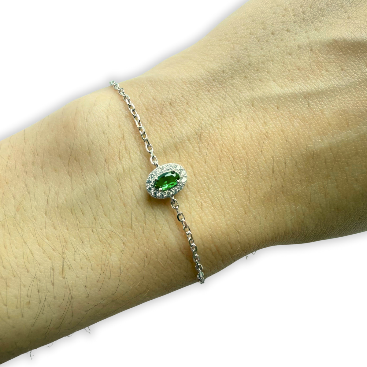 Pulsera de plata con circonita verde ovalada y halo de circonitas blancas