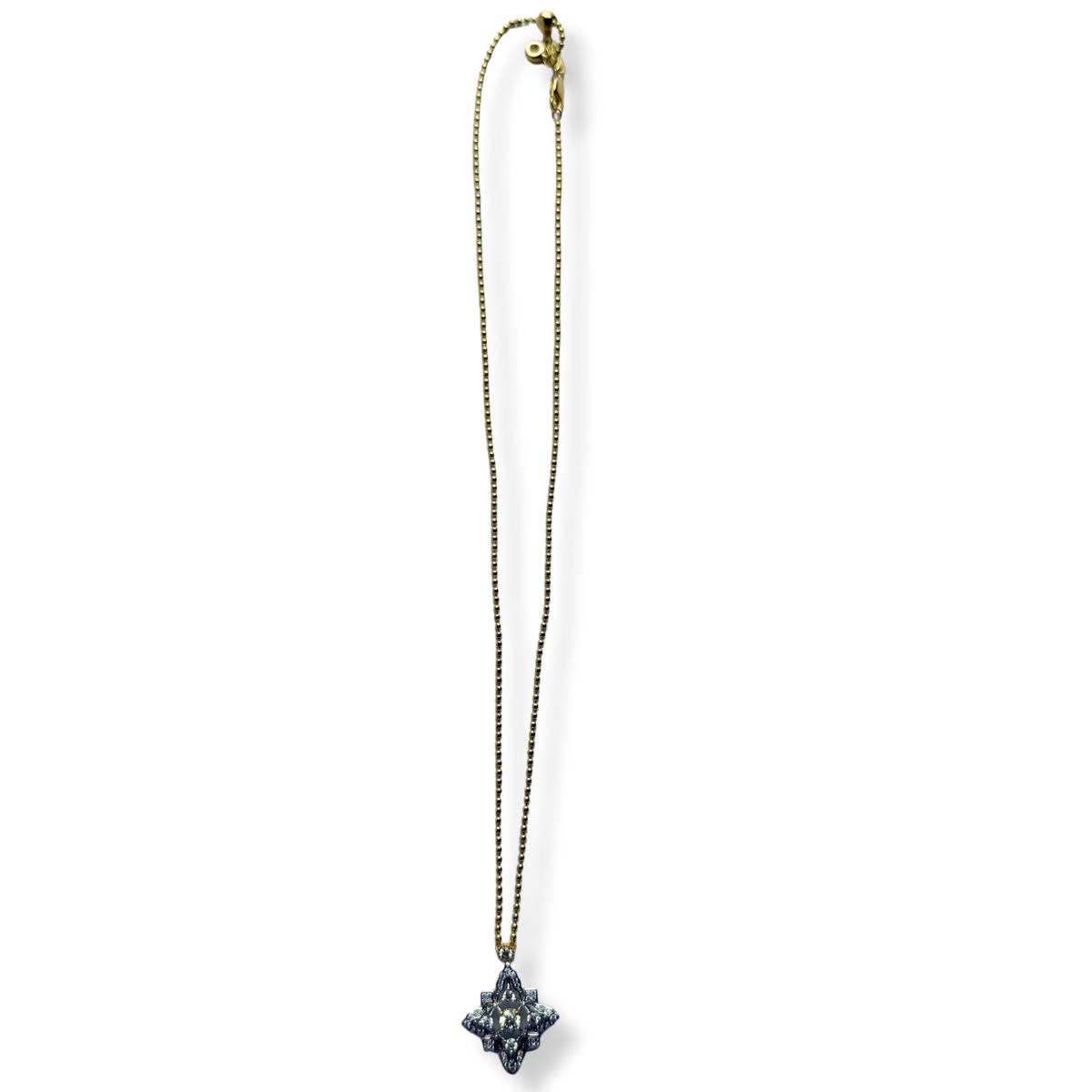 Collar de plata con baño de oro amarillo y dije de cuatro puntas con circonitas