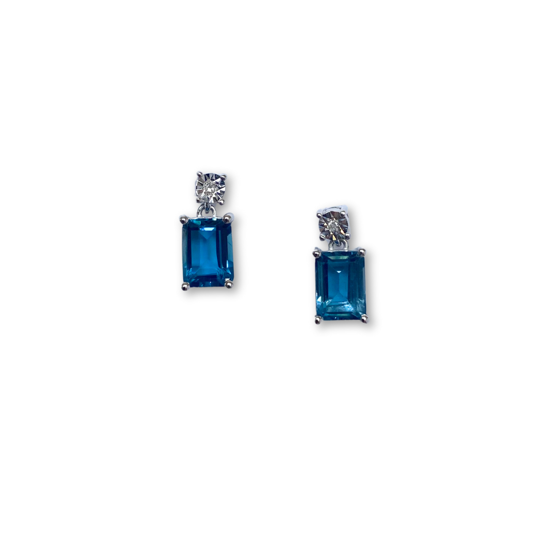 Aretes en oro blanco 10k con topacio london blue y diamantes 0.01ctw
