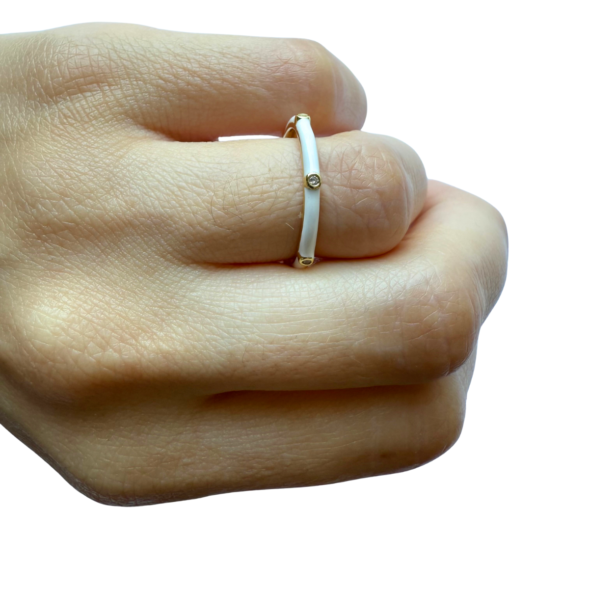 Anillo de plata con baño de oro amarillo con esmalte blanco y zafiro blancos