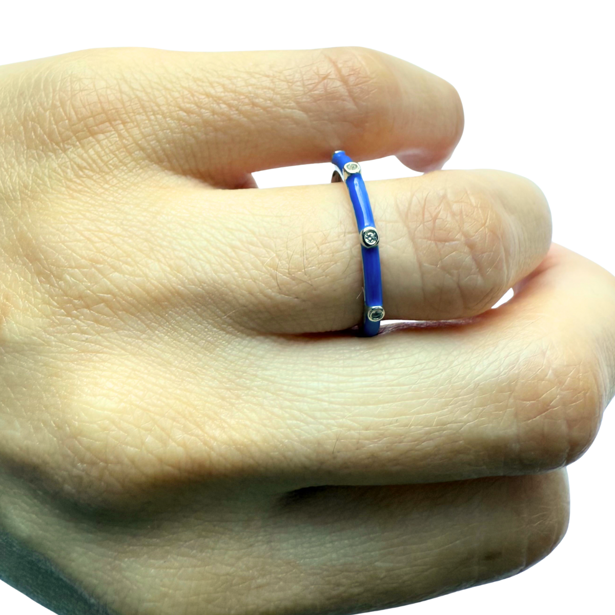 Anillo de plata con esmalte azul y zafiros blancos