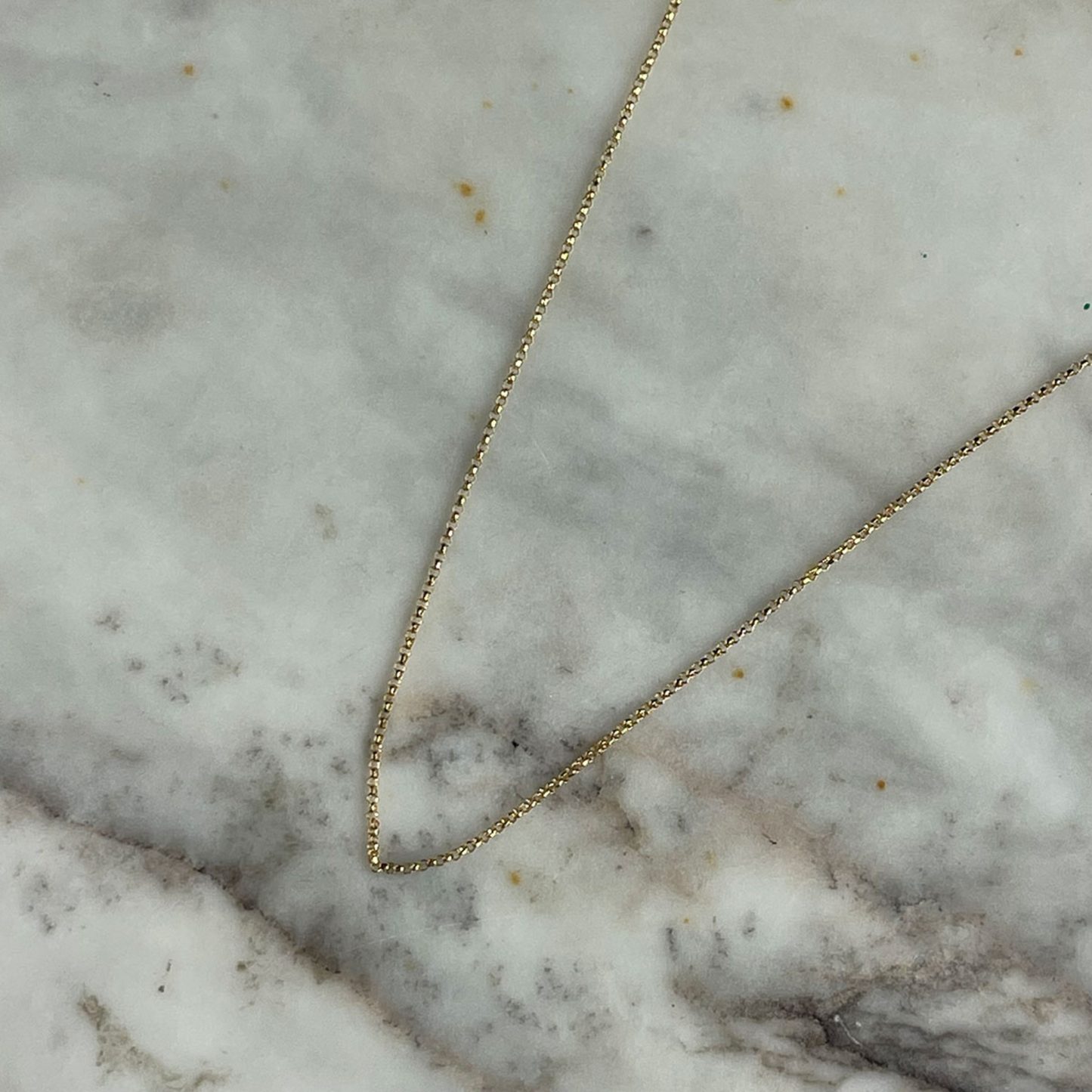 Cadena mini rolo en oro amarillo 14k