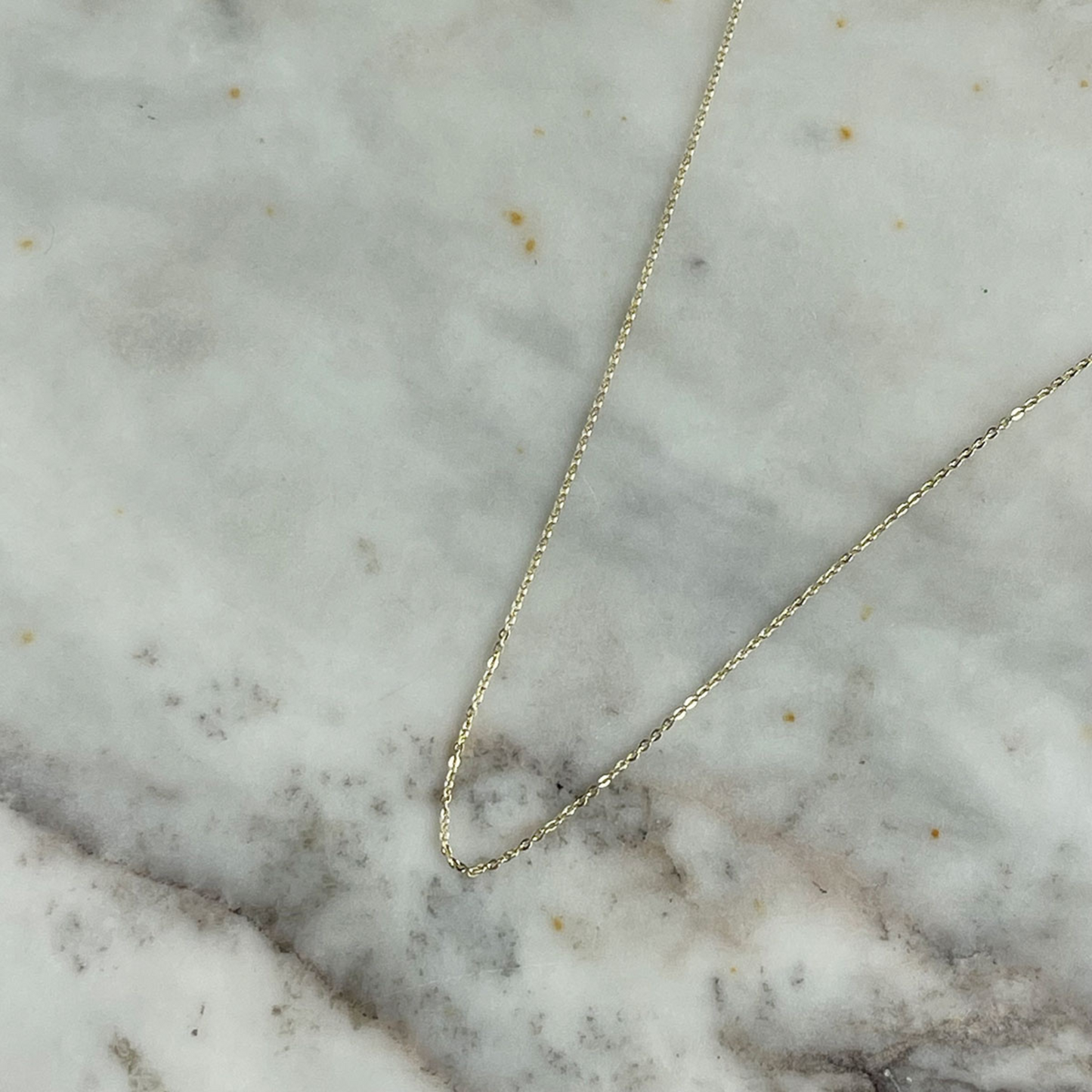 Cadena baby cable en oro amarillo 14k