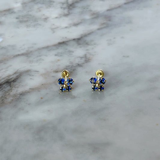 Aretes en oro amarillo 14K con mariposa con circonita azul y bolita de oro en el centro con tope rosca