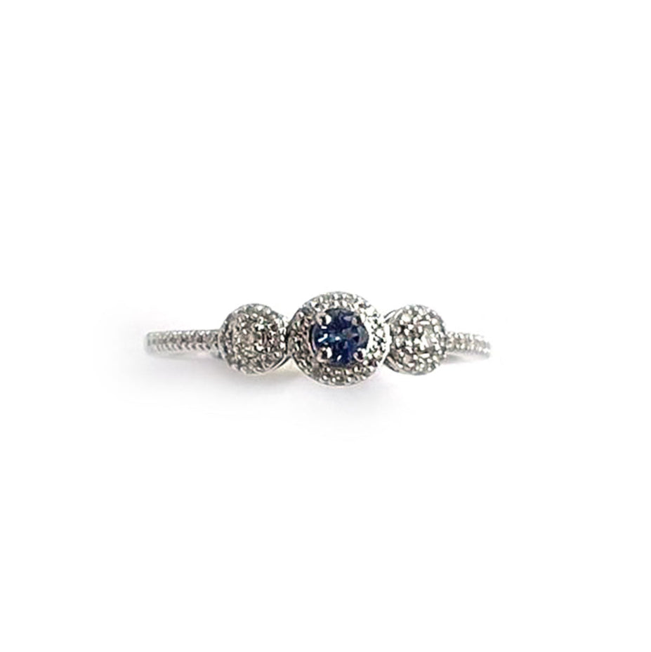Anillo en oro blanco 14K con con tanzanita redonda 0.13ctw y diamantes 0.16ctw