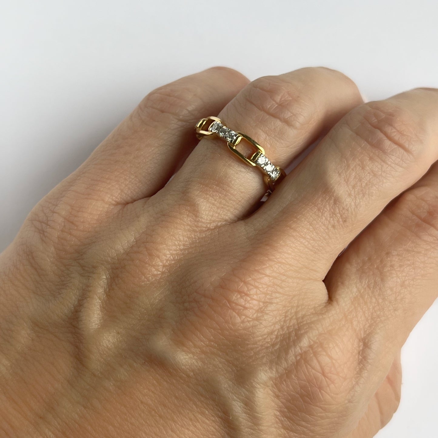 Anillo de plata con baño de oro rosa en forma de eslabones con diamantes de laboratorio 0.54ct