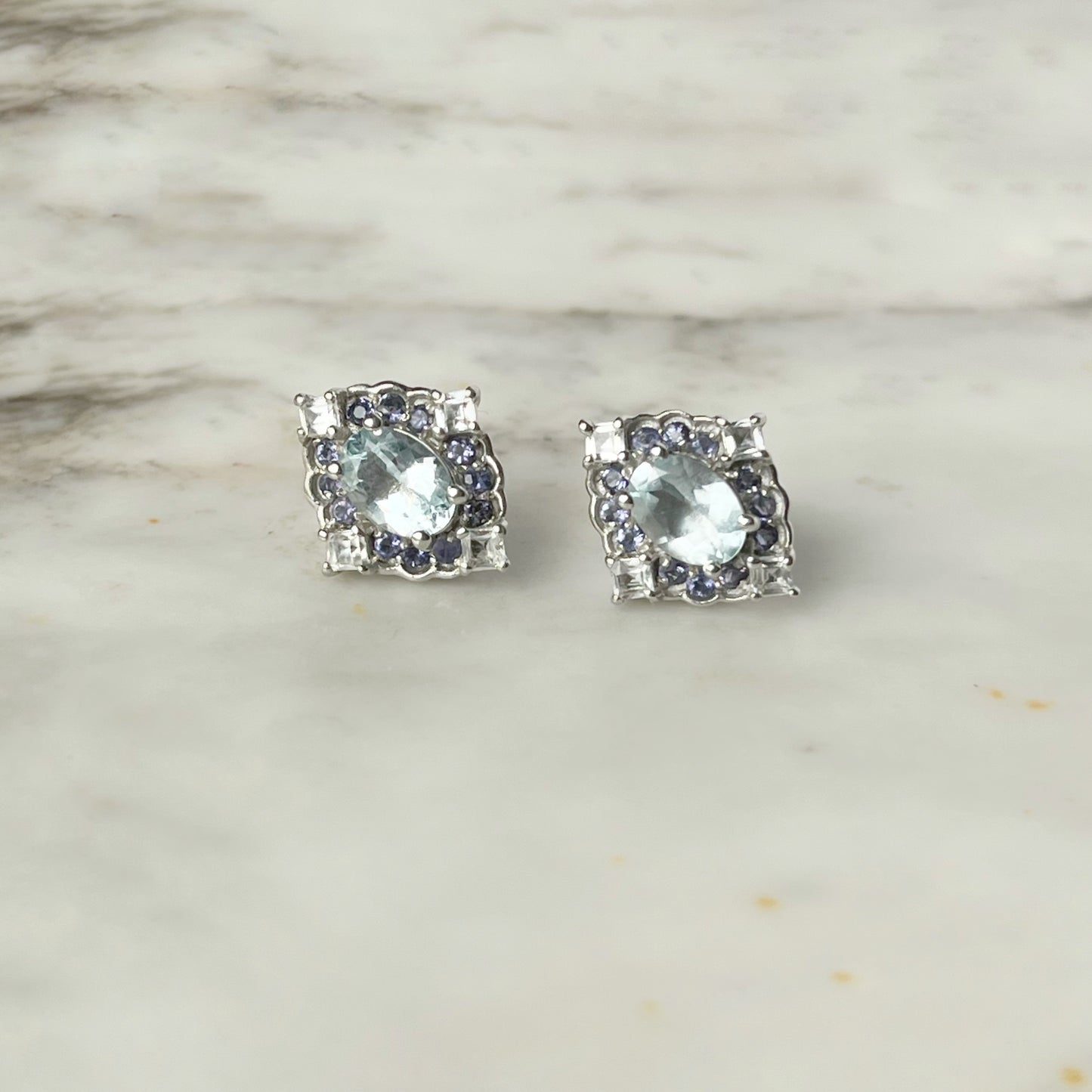 Aretes en plata con aquamarina, iolita y circón blanco