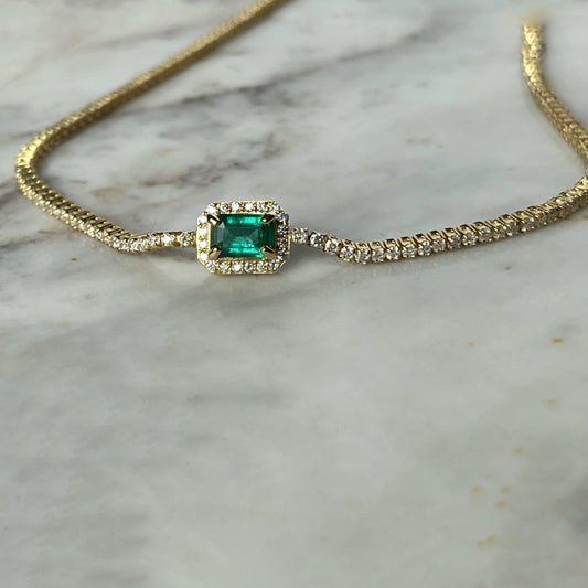 Choker tenis de oro amarillo de 18K con diamantes 2.48ctw y esmeralda 0.53ct