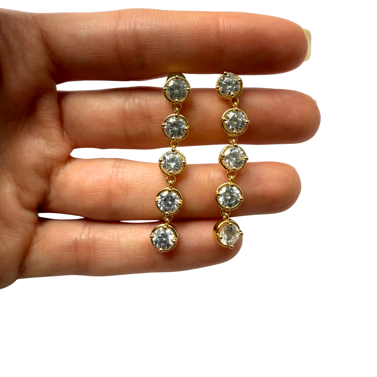 Aretes de plata con baño de oro amarillo y fila de circones colgantes redondos