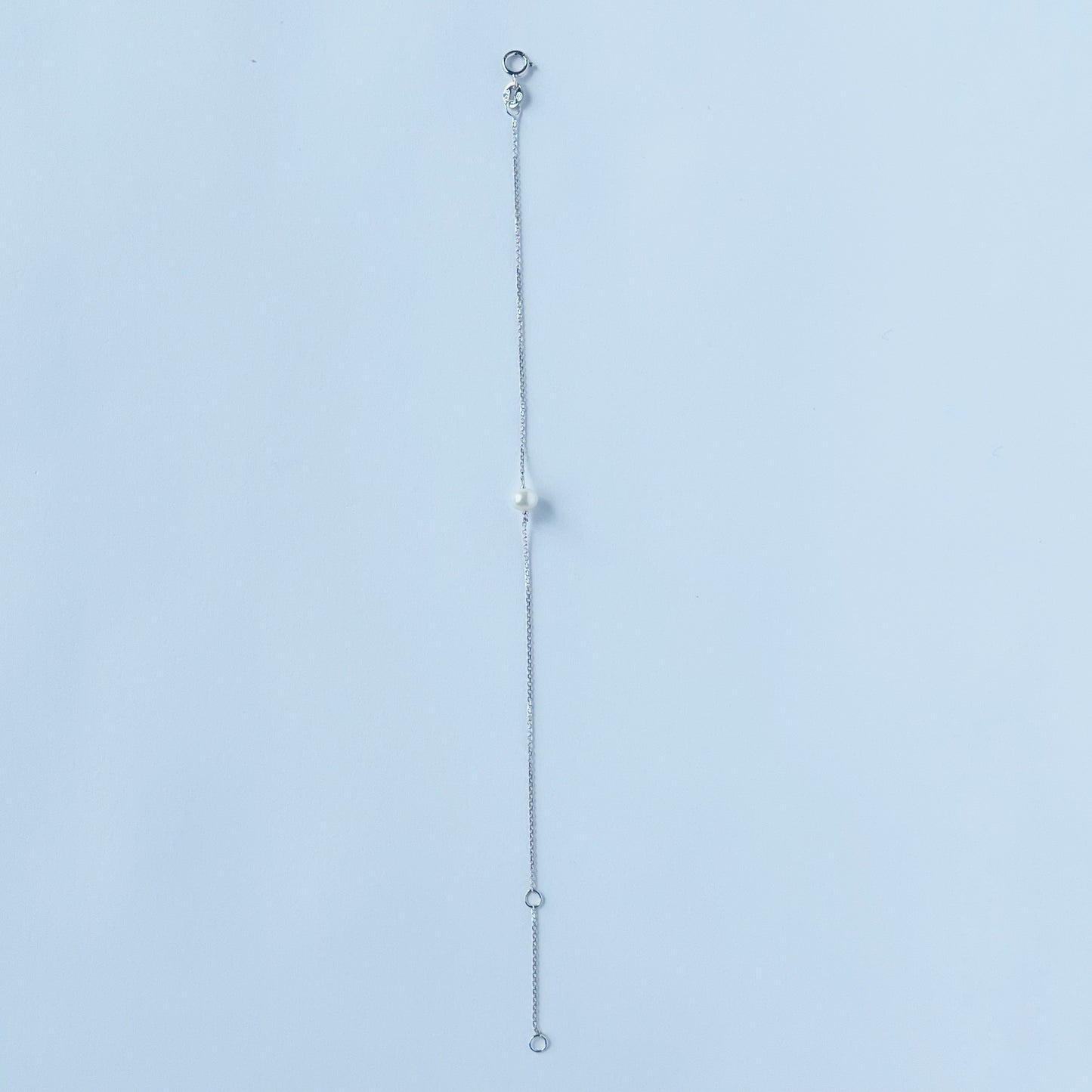Pulsera en oro blanco 14k y perla