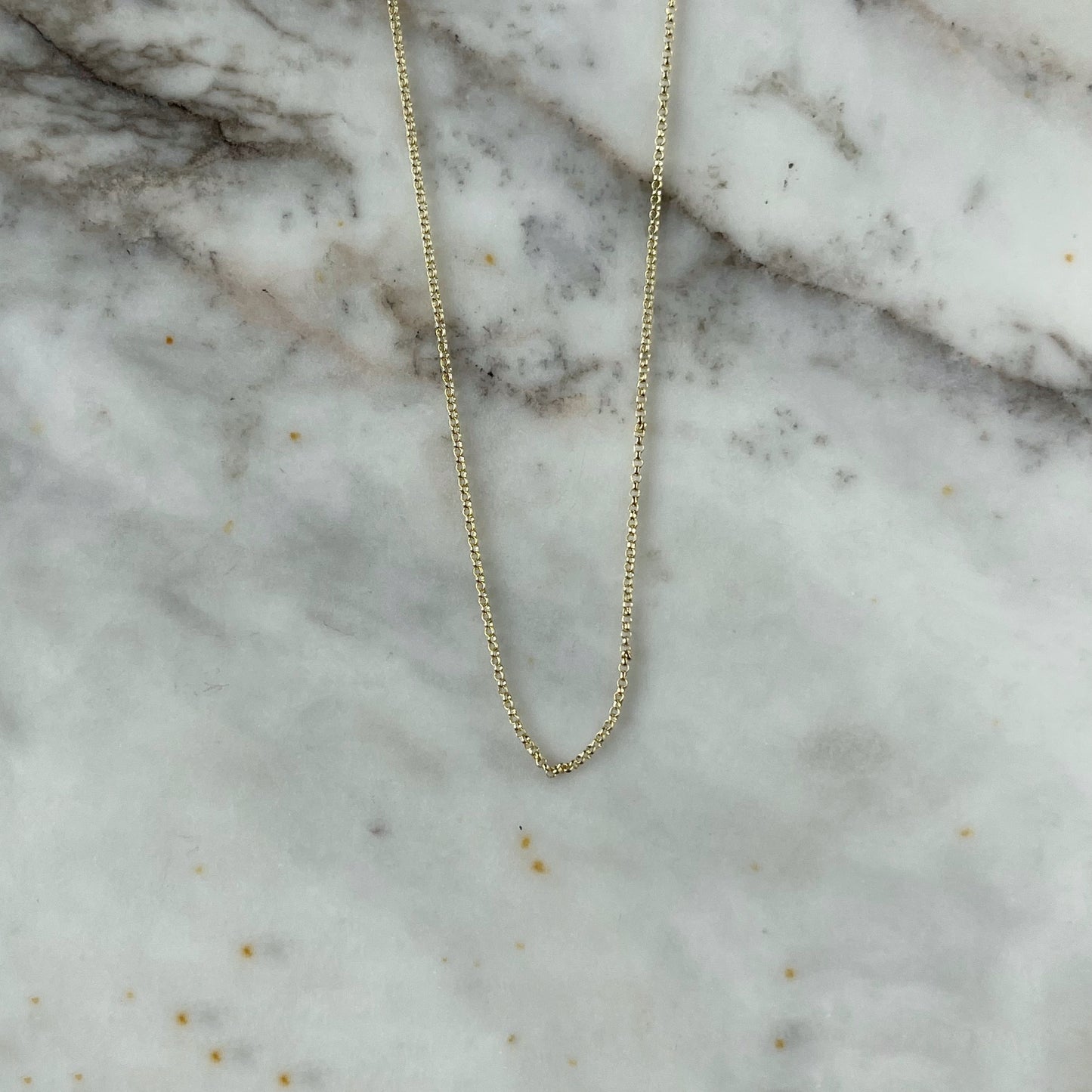Cadena mini rolo en oro amarillo de 14k