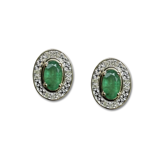 Aretes en oro amarillo 10K con esmeralda ovalada y halo de diamantes 0.05ctw