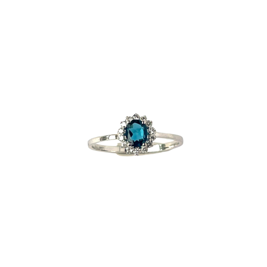 Anillo en oro blanco 10k con topacio london blue y halo de diamantes 0.11 ctw