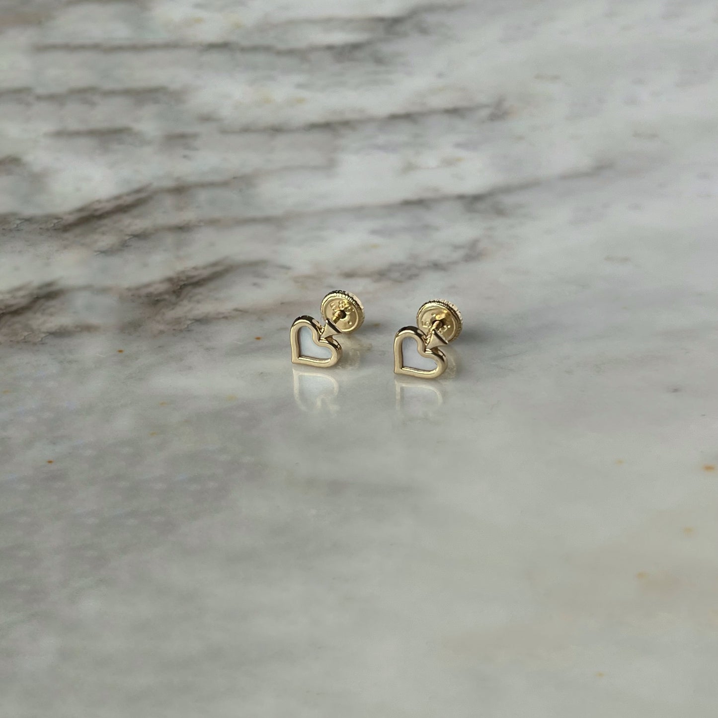Aretes en oro amarillo de 14k de picas con broche rosca