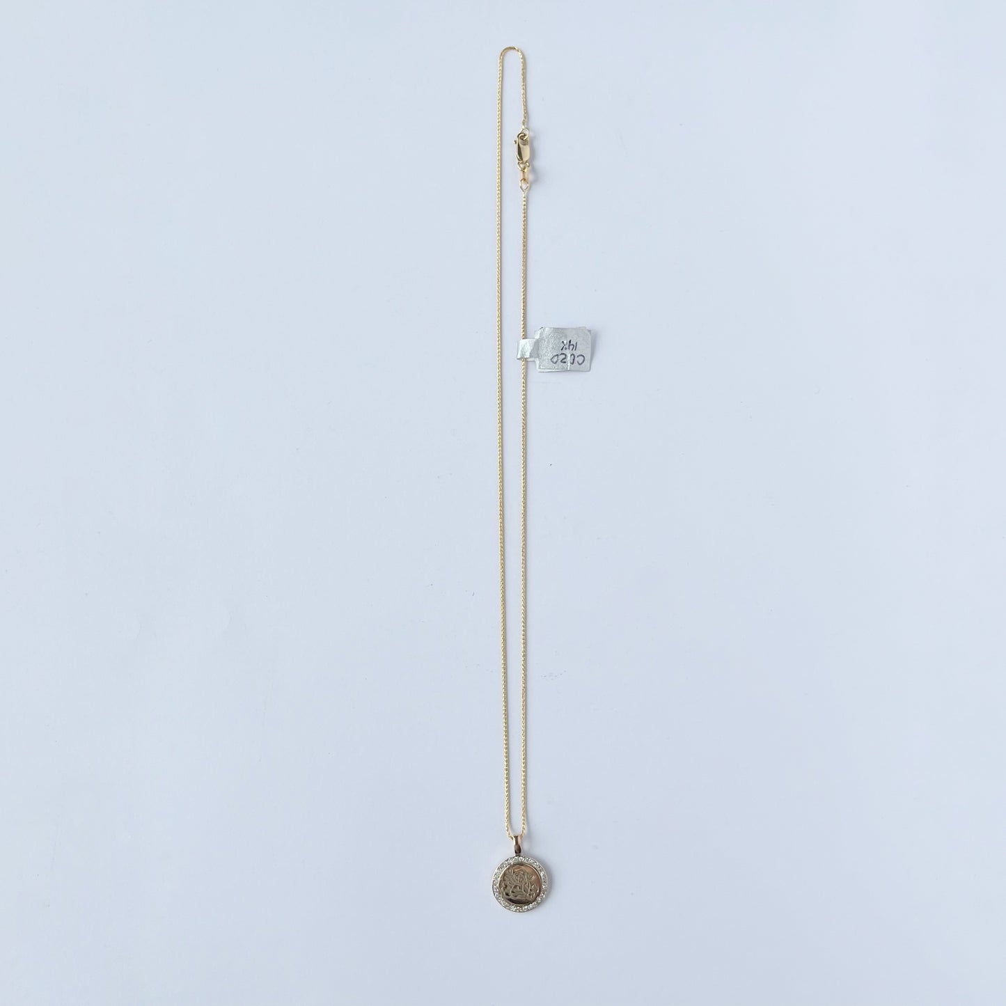 Dije de ángel de la guarda con halo de diamantes en oro de 14k