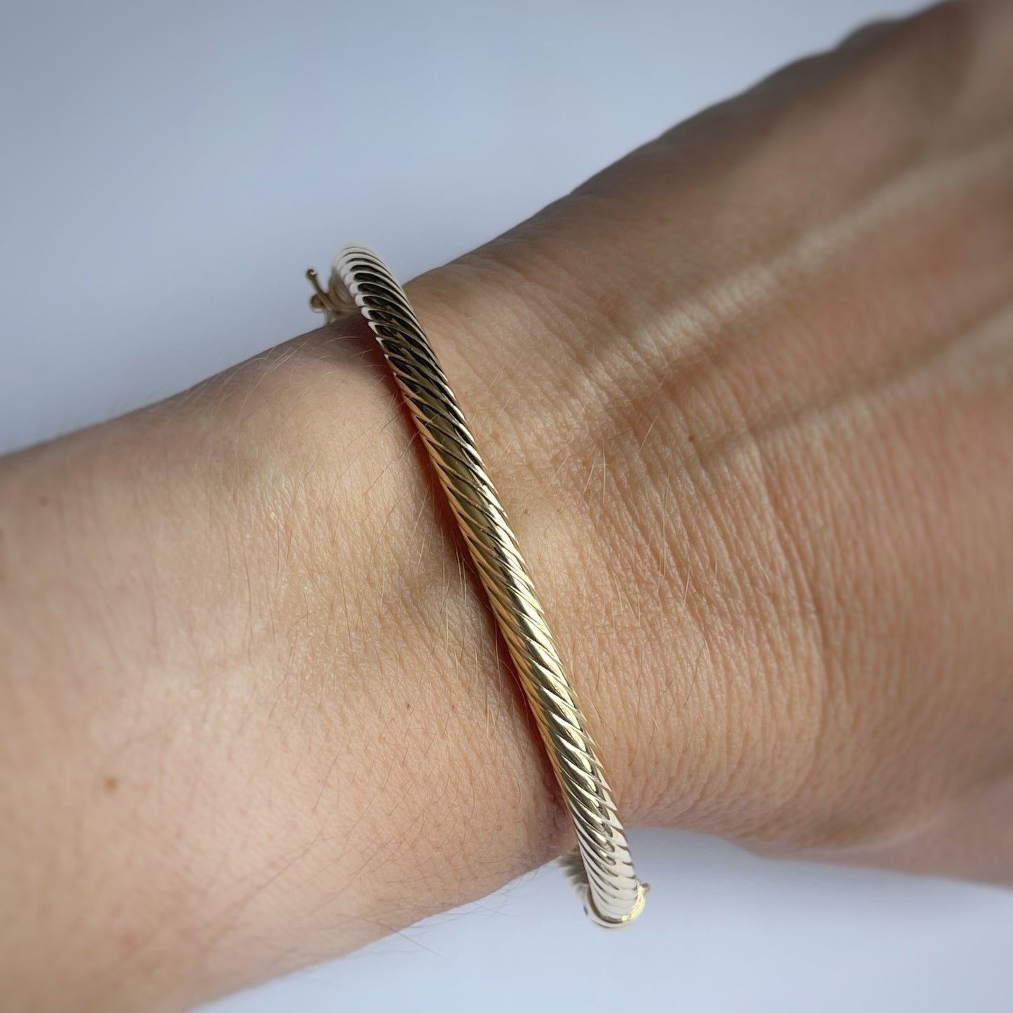 Pulsera caña entorchada en oro amarillo 14K