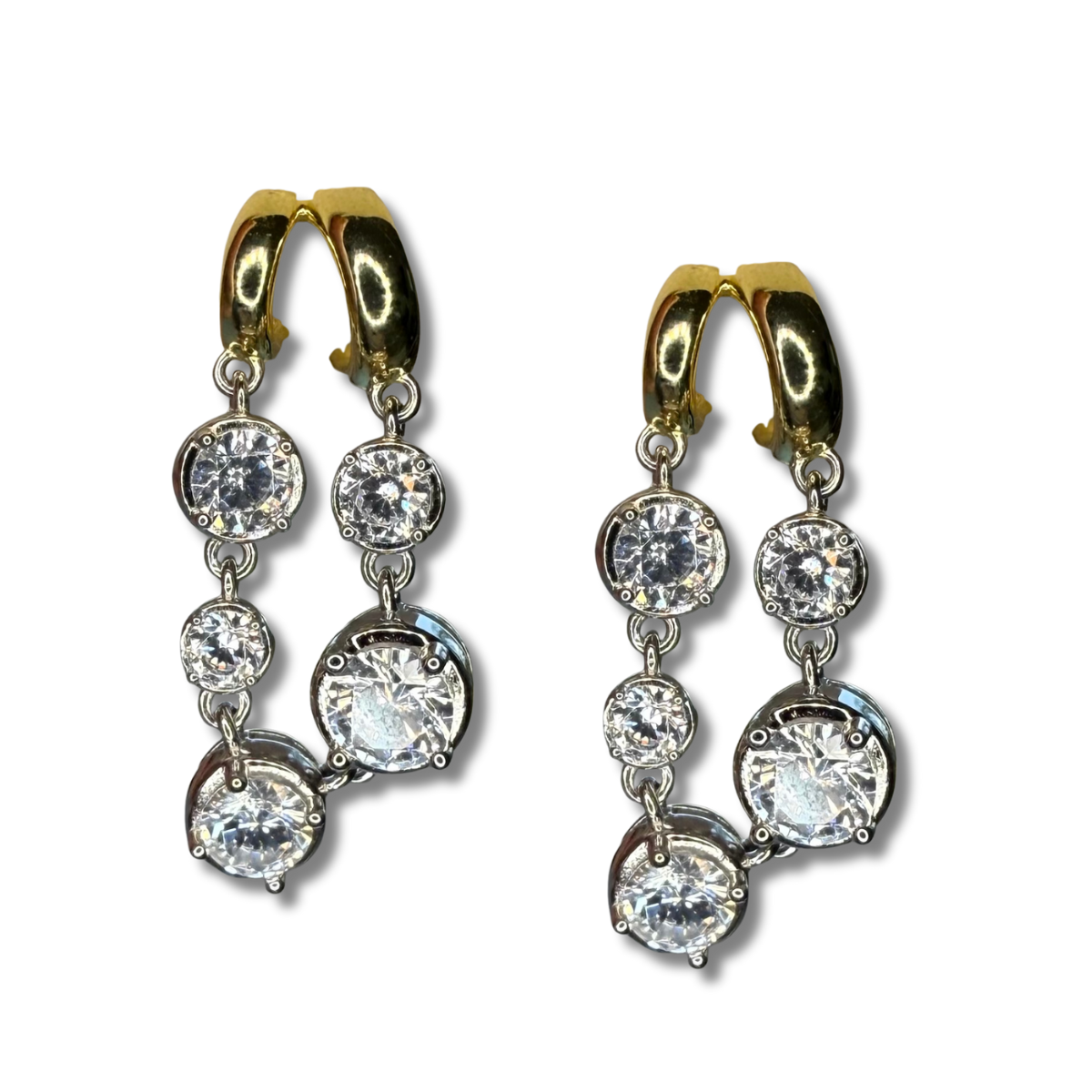 Aretes de plata con baño platino y baño de oro amarillo con doble fila de circones redondos colgando y doble argolla