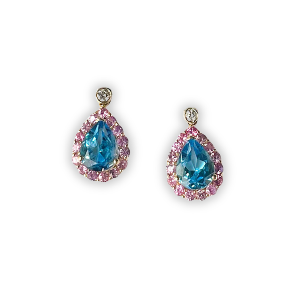 Aretes en oro amarillo 14K con espineles rosado y topacio azul corte pera y topacio blanco