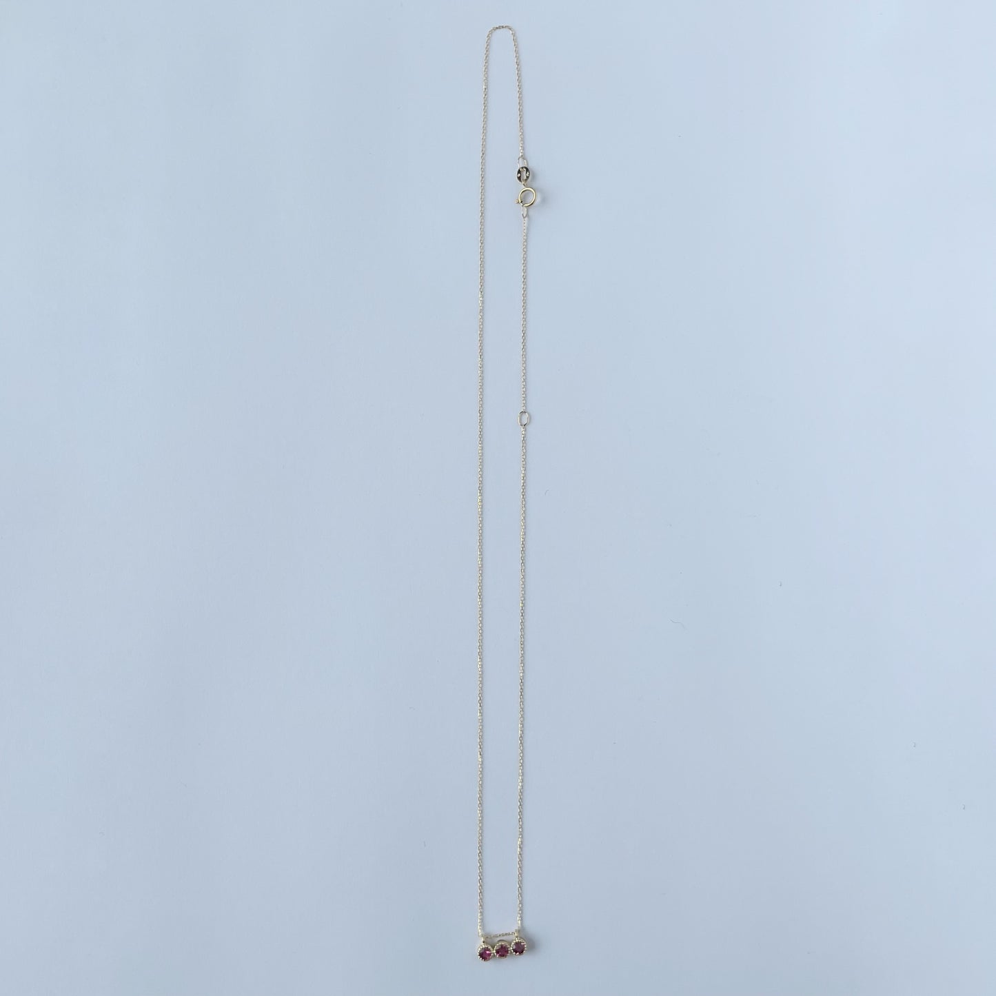 Collar en oro amarillo 14k con tres turmalinas rosadas 0.31ctw