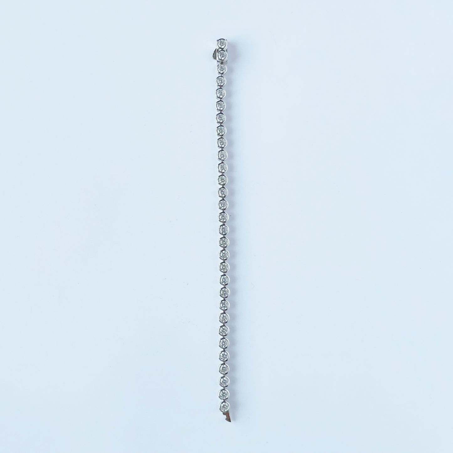 Pulsera tipo tenis con circonitas redondas biseladas 10ctw