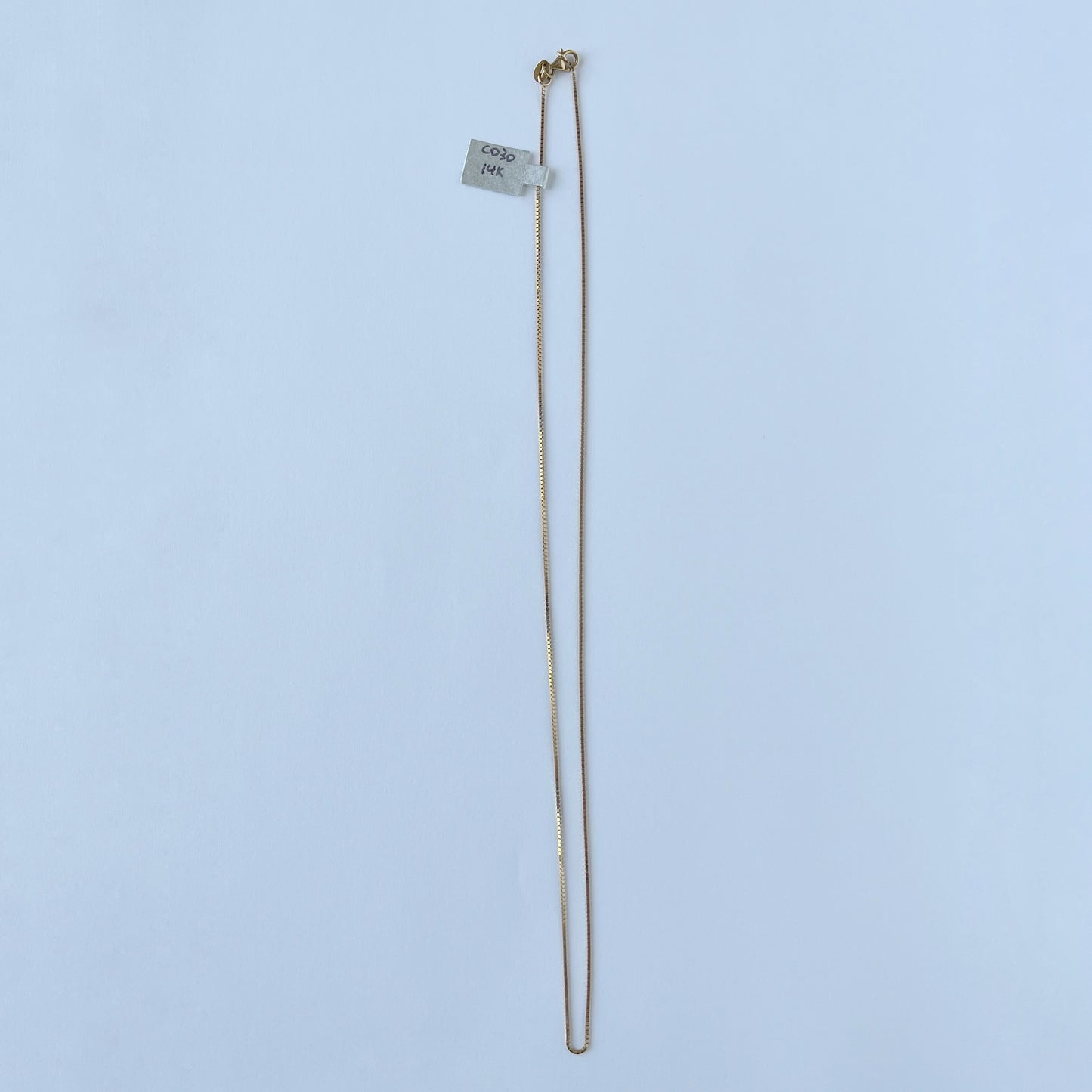 Cadena box en oro amarillo 14k