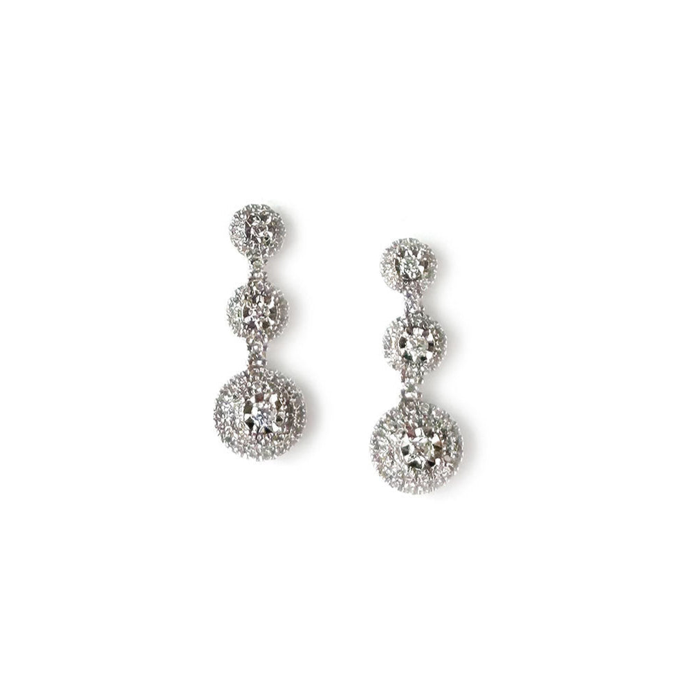 Aretes de tres círculos en oro blanco 10k con diamantes 0.50ctw