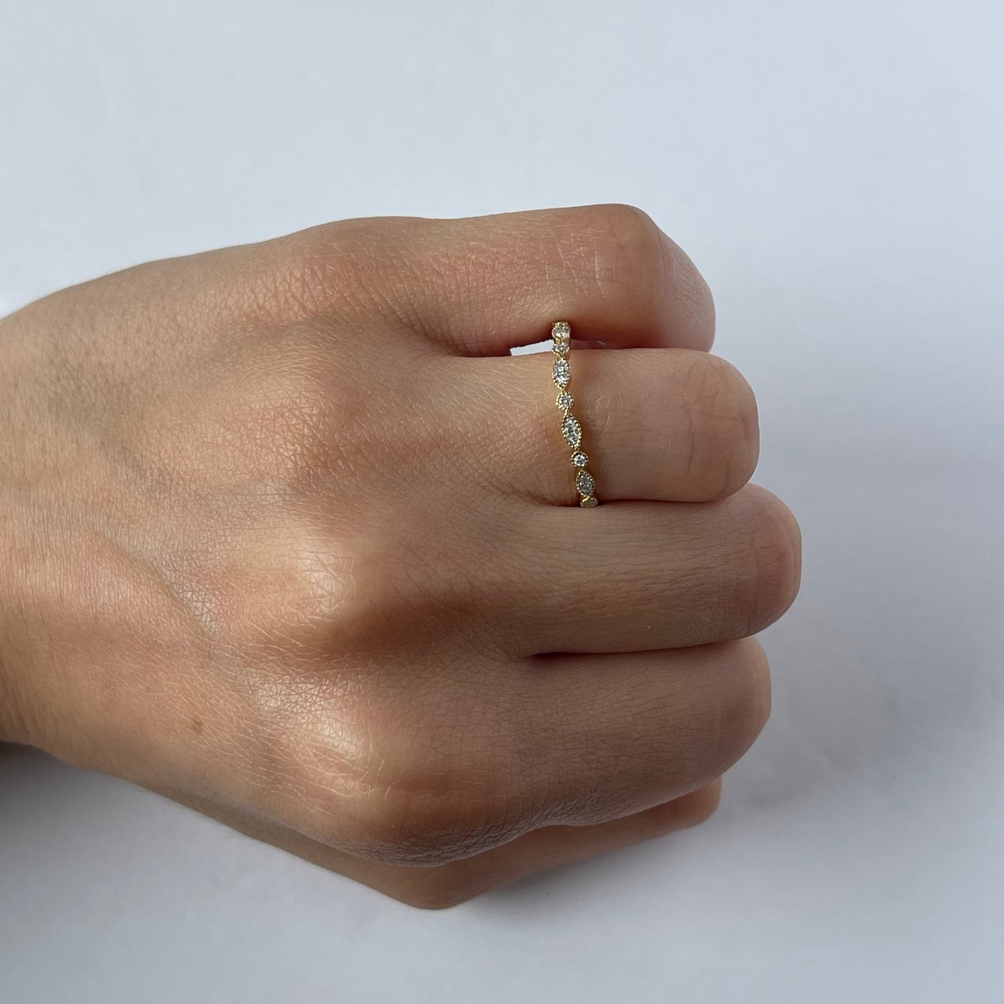 Anillo curva en oro amarillo 14K con diamantes 0.08ctw