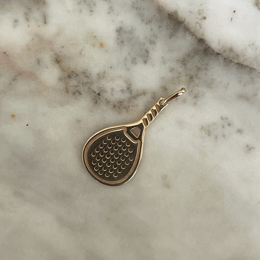Dije pala de padel en plata con baño de oro amarillo