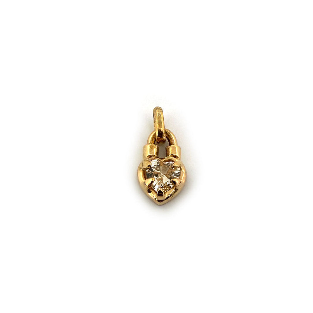 Dije en oro amarillo 14k con corazón de zafiro amarillo