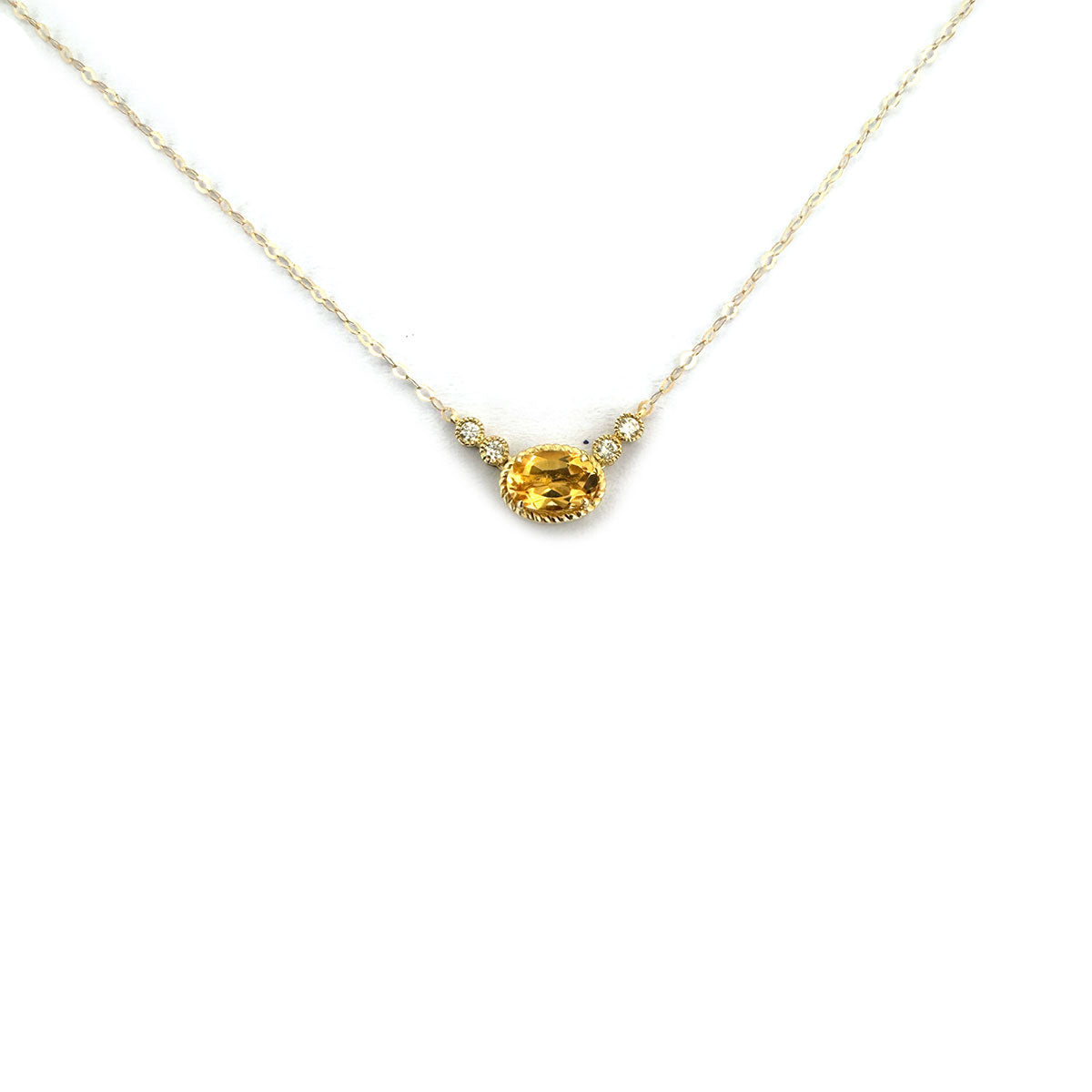 Collar en oro amarillo 10K con citrino ovalado y diamantes 0.08ctw