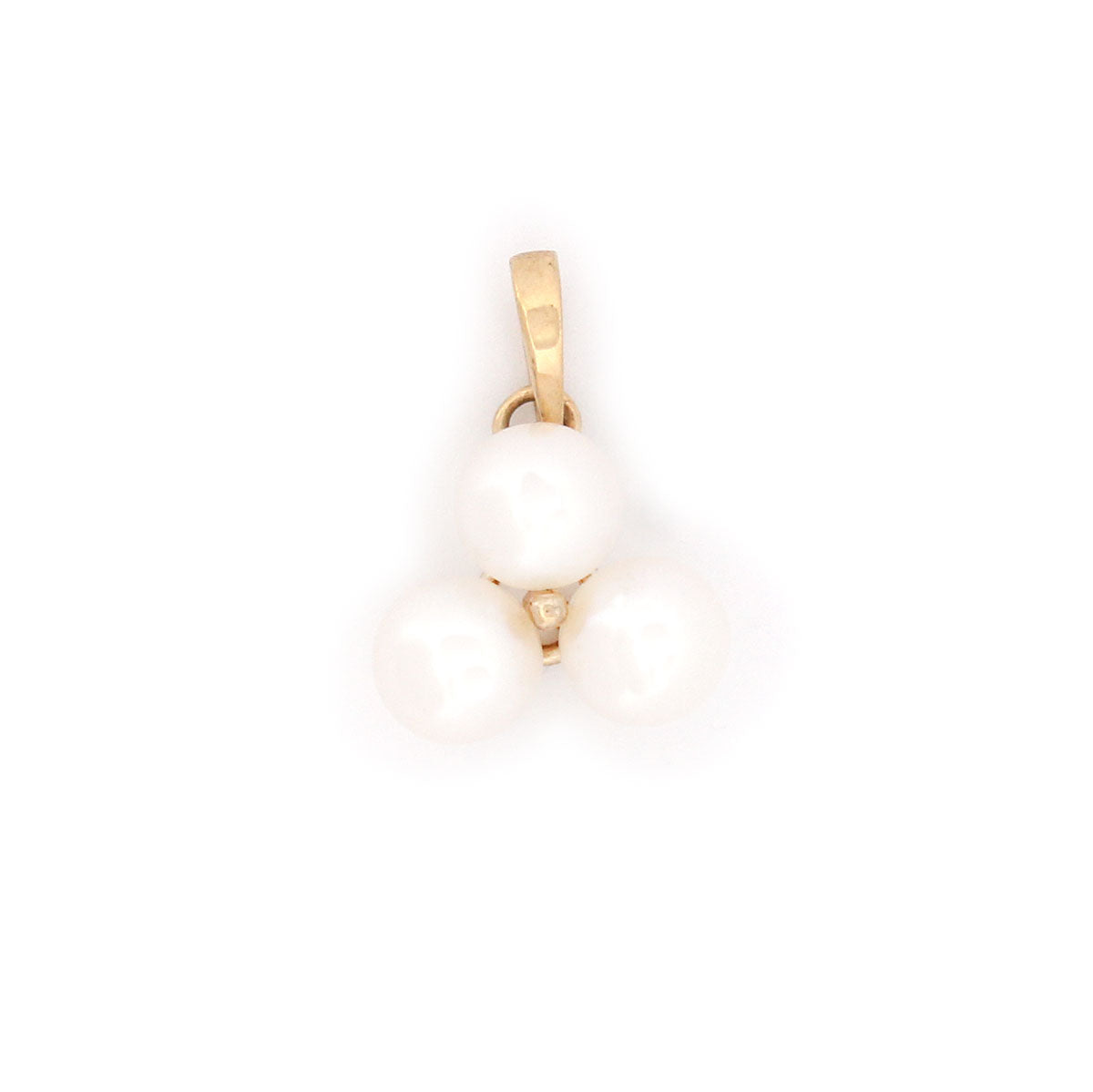 Dije de oro amarillo 14k con tres perlas