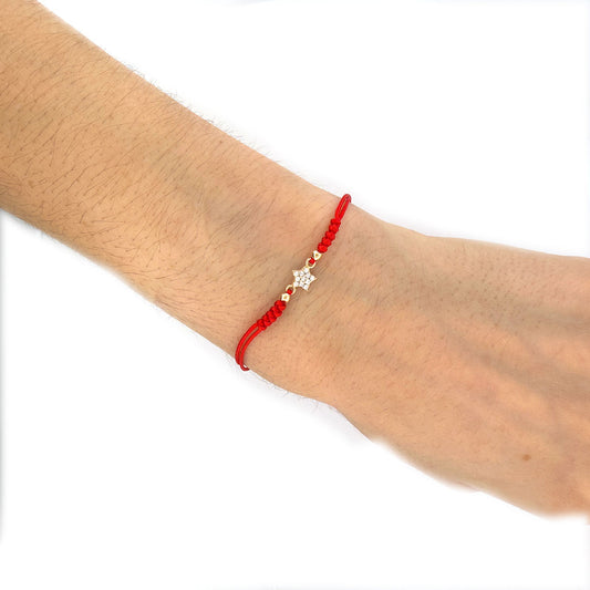 Pulsera de cordón rojo con estrella de circonitas en oro amarillo 14K