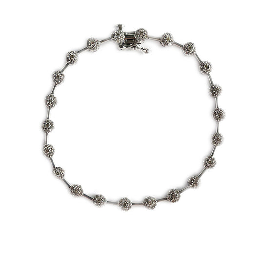 Pulsera en oro blanco 10K con 2ctw de diamantes con florcitas