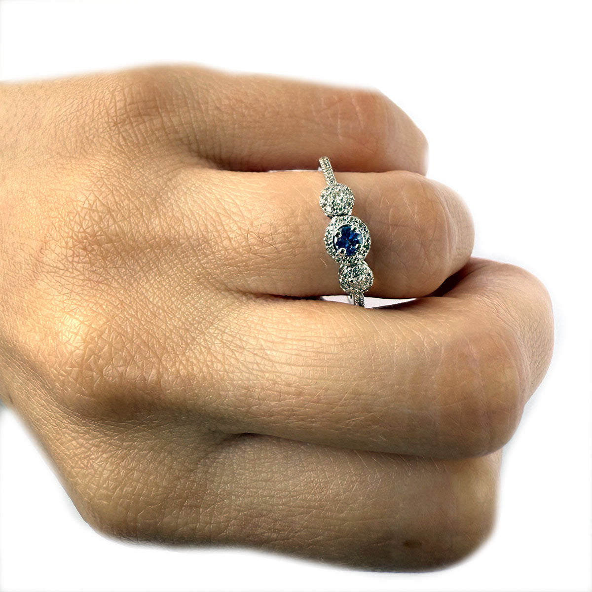 Anillo en oro blanco 14K con con tanzanita redonda 0.13ctw y diamantes 0.16ctw