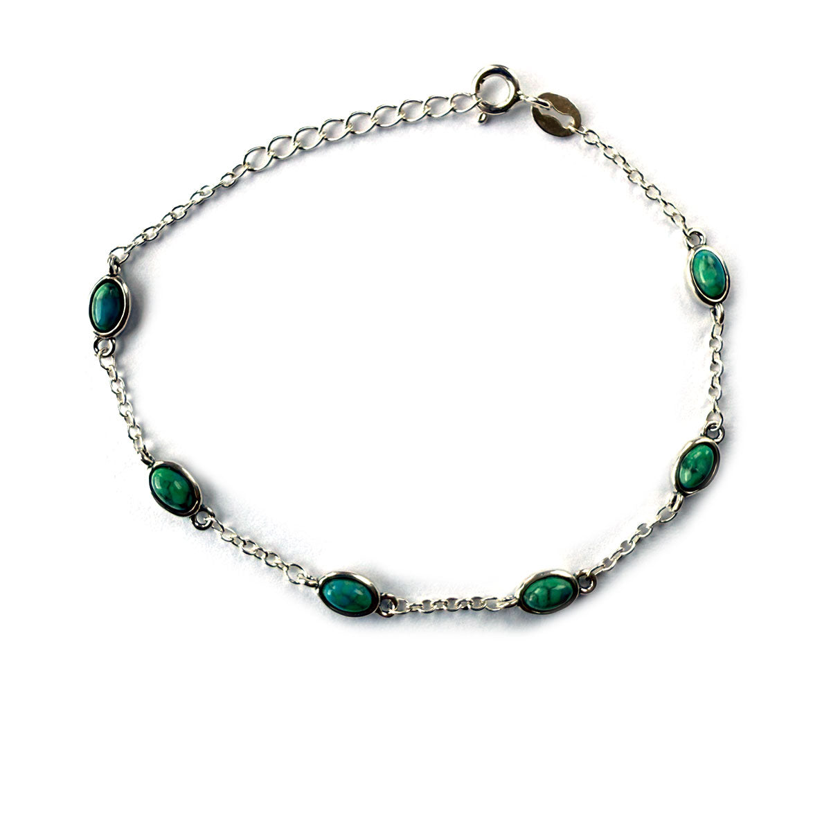 Pulsera de plata con estaciones de turquesa ovalada