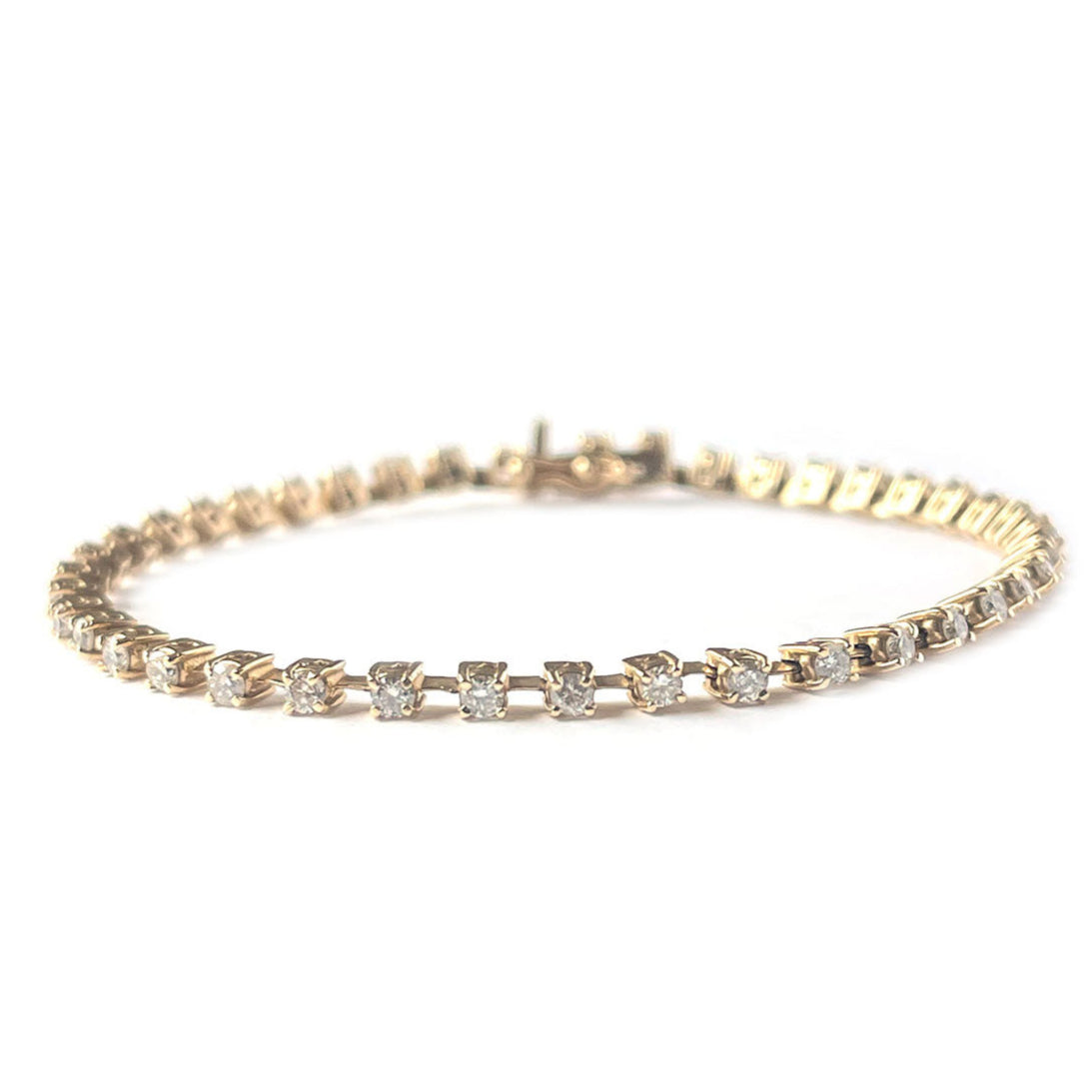Pulsera tenis en oro amarillo 14K con diamantes espaciados 1.75ctw