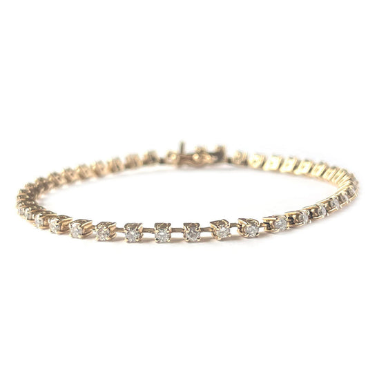 Pulsera tenis en oro amarillo 14K con diamantes espaciados 1.75ctw