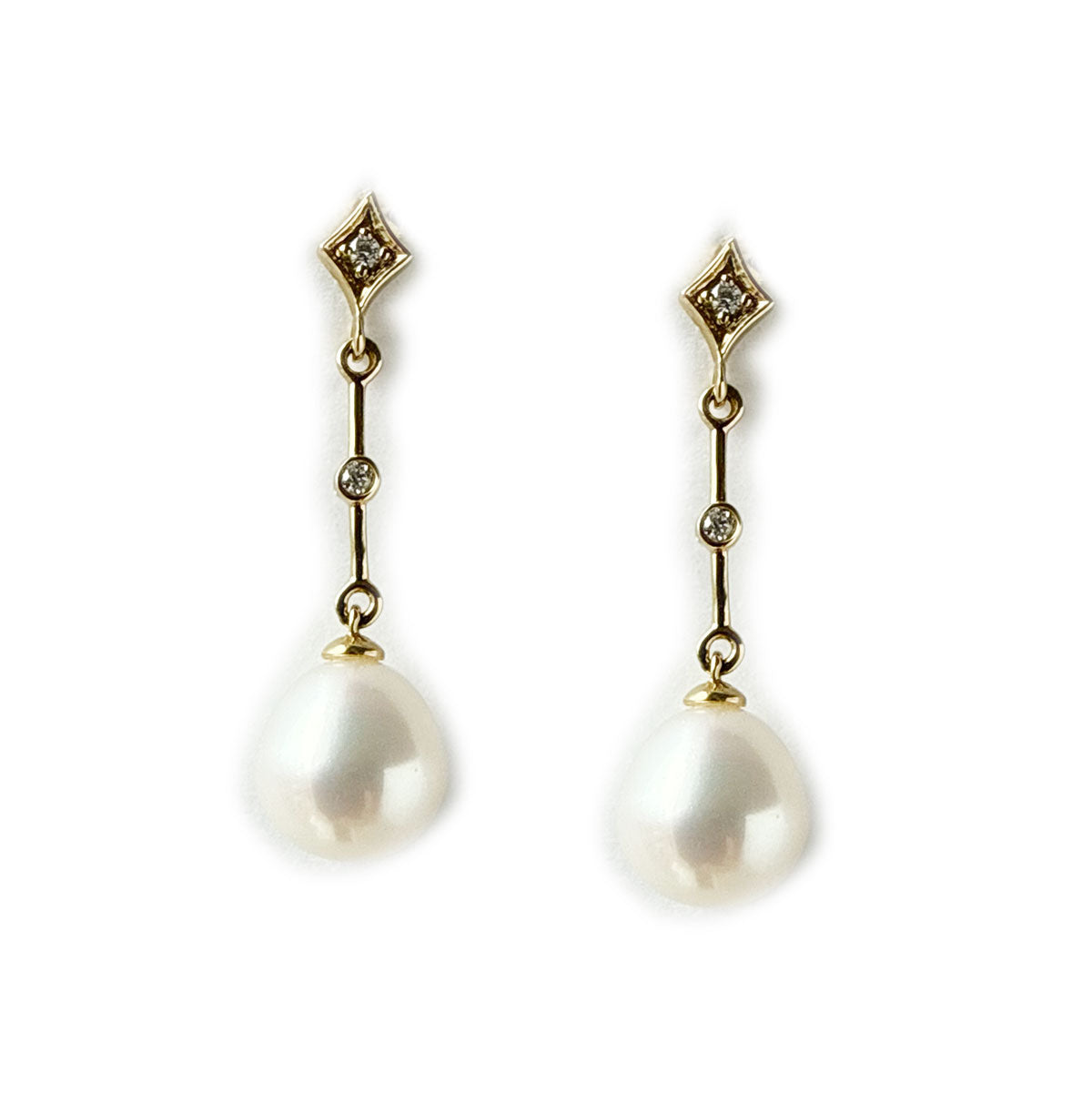 Aretes largos de oro amarillo 14K con perla y diamantes 0.05ctw
