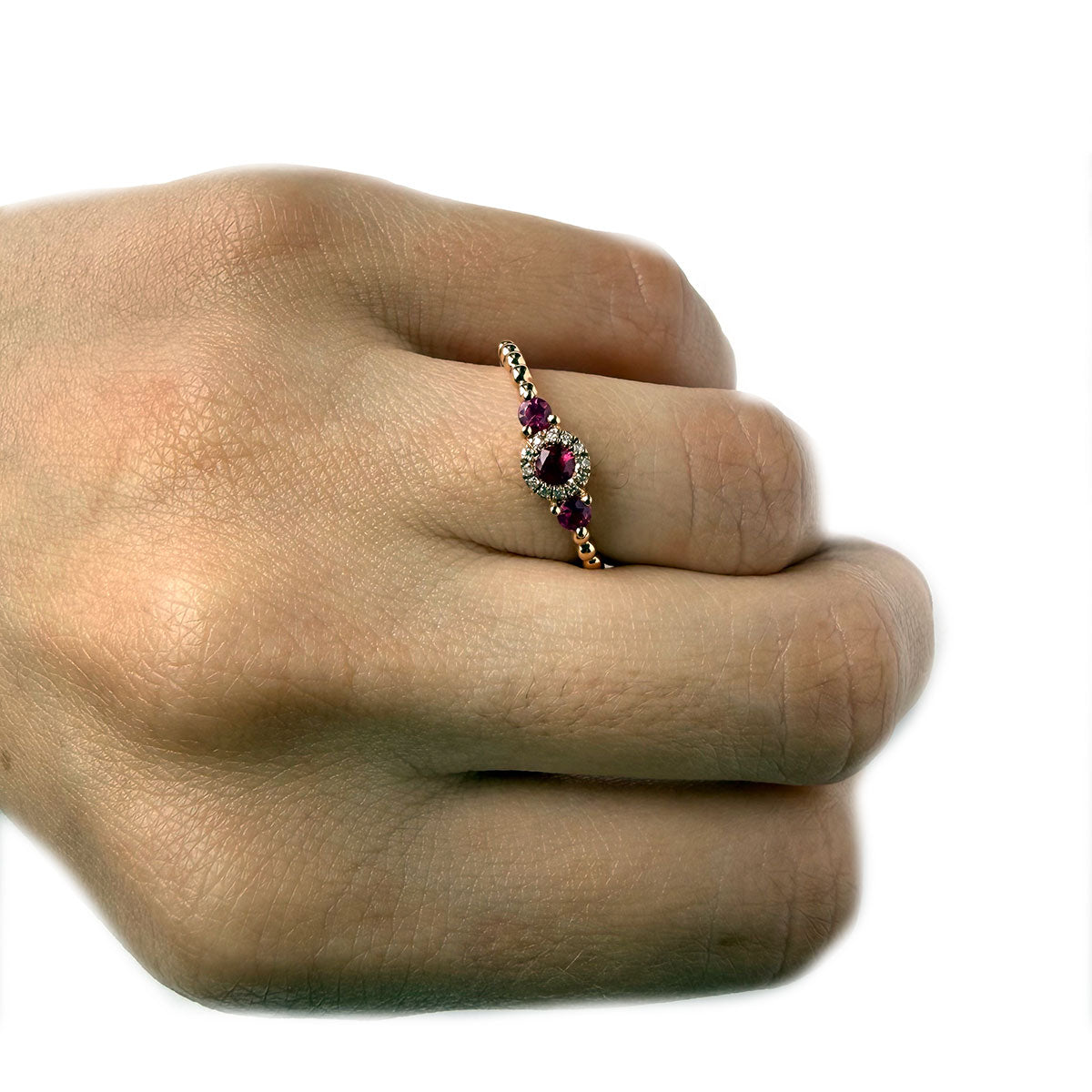 Anillo en oro rosa 14K con rubíes y diamantes 0.05ctw en aro de bolitas