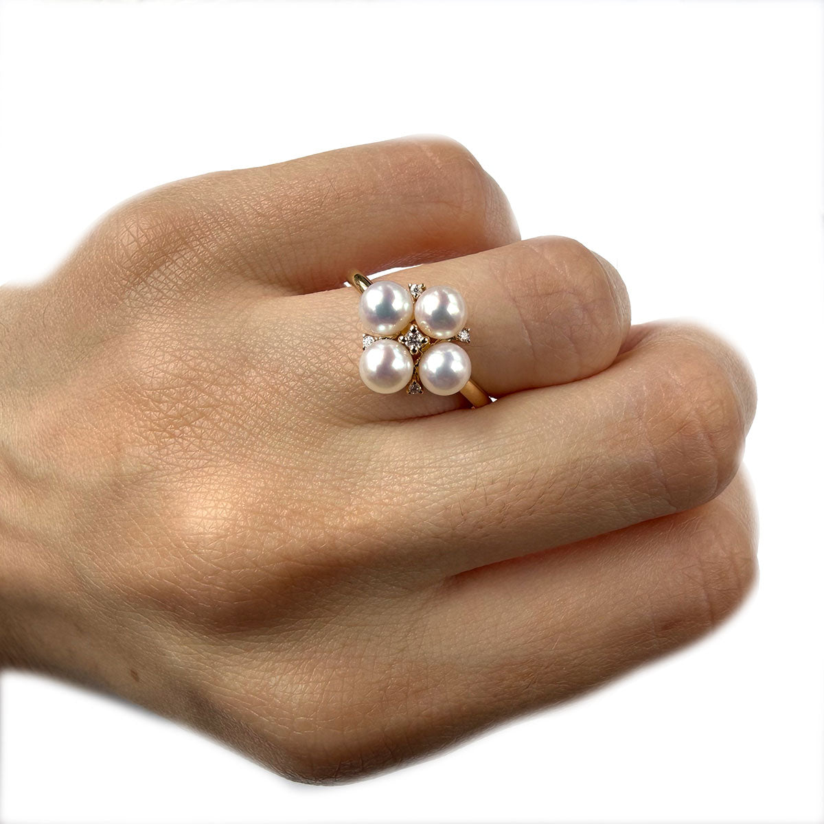 Anillo en oro amarillo 14K con flor de perlas y diamantes 0.05ctw