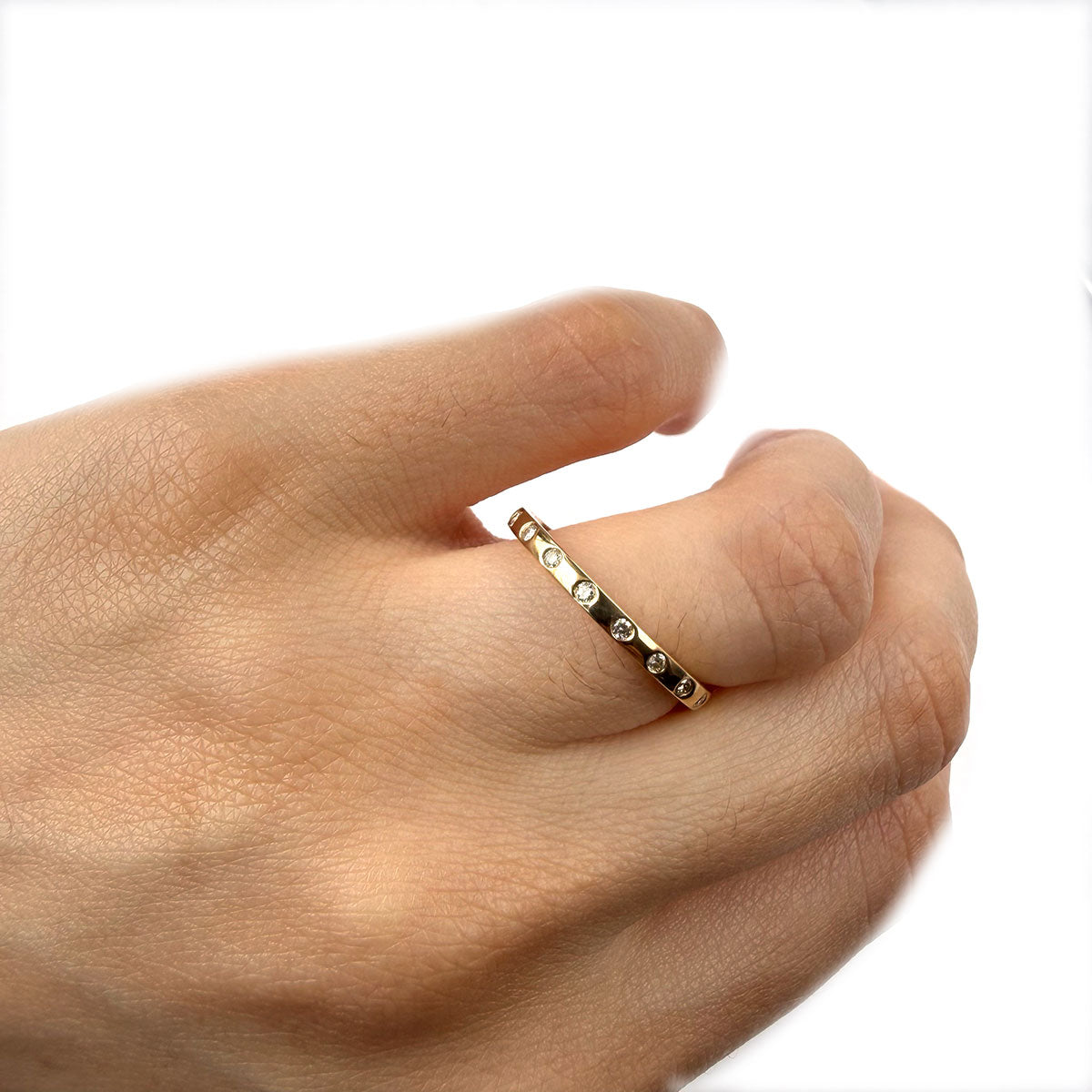 Anillo en oro amarillo 10K con diamantes incrustados 0.15ctw