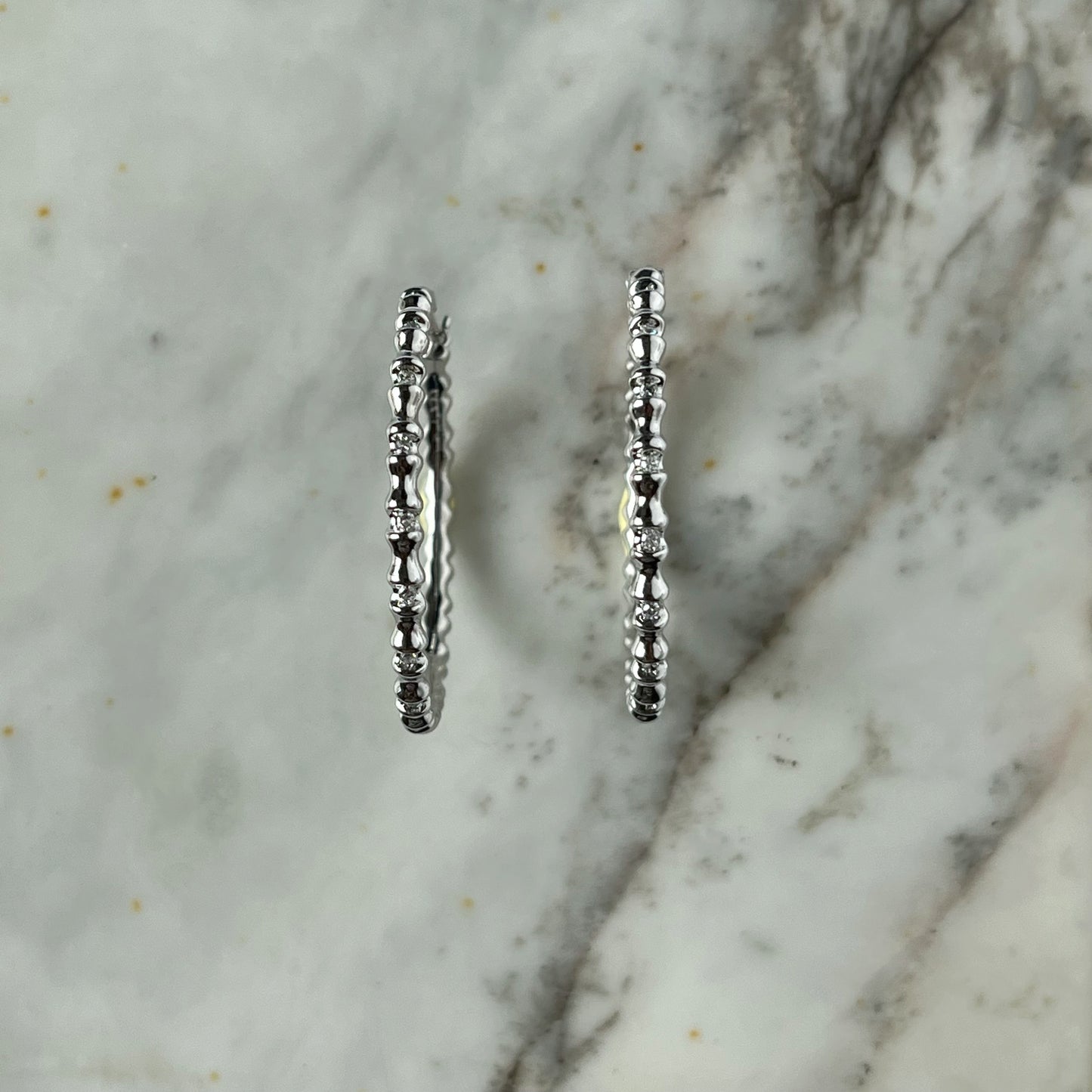 Argollas de plata de bolitas con diamantes 0.12ctw